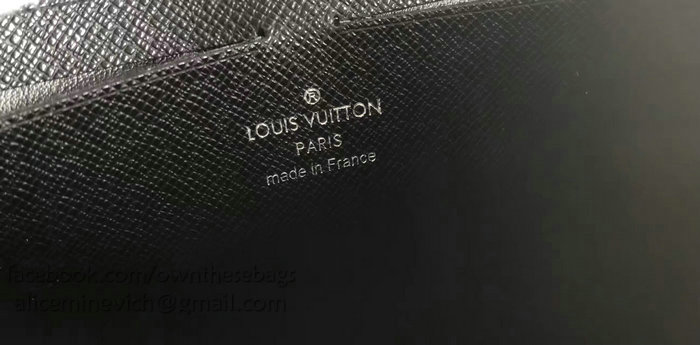 Louis Vuitton Taiga leather Pochette Voyage MM Black M30677